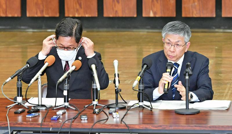 会見者